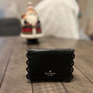 KATE SPADE NWOT NY Lacy mini wallet. Black leather with gold lettering.